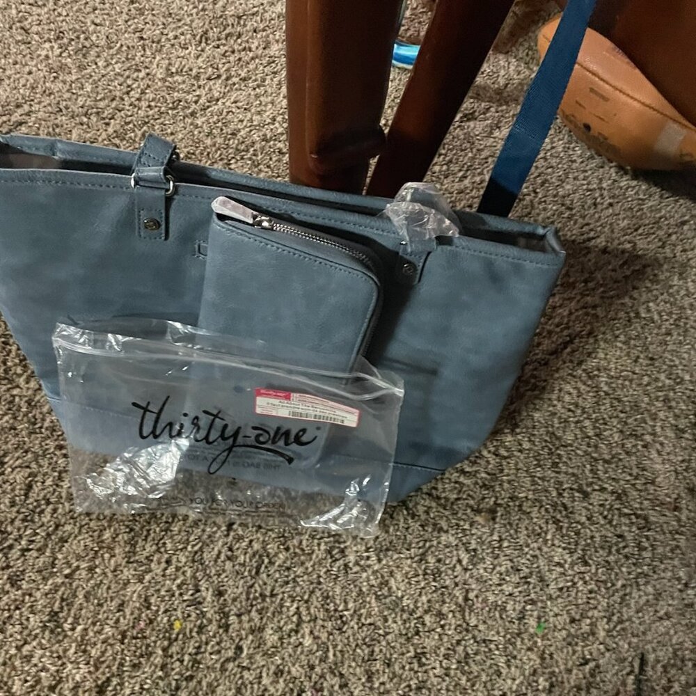 31  blue suede bag and matching wallet. Brand new not used